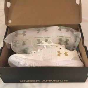 White and gold UA Block City sneakers